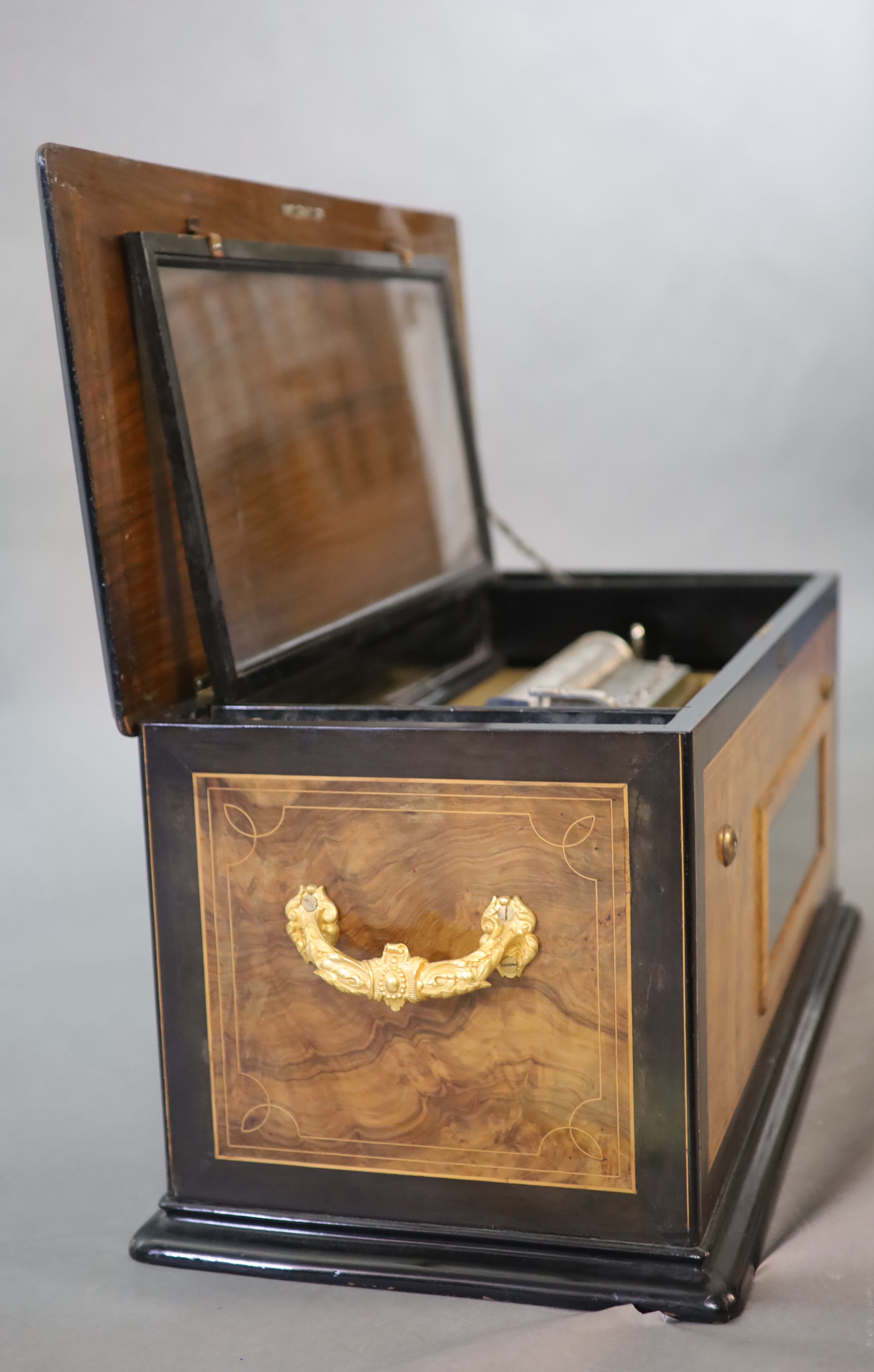 A rare Swiss quatre-revolver cylinder musical box, late 19th century 88 x 36cm, 38cm high.